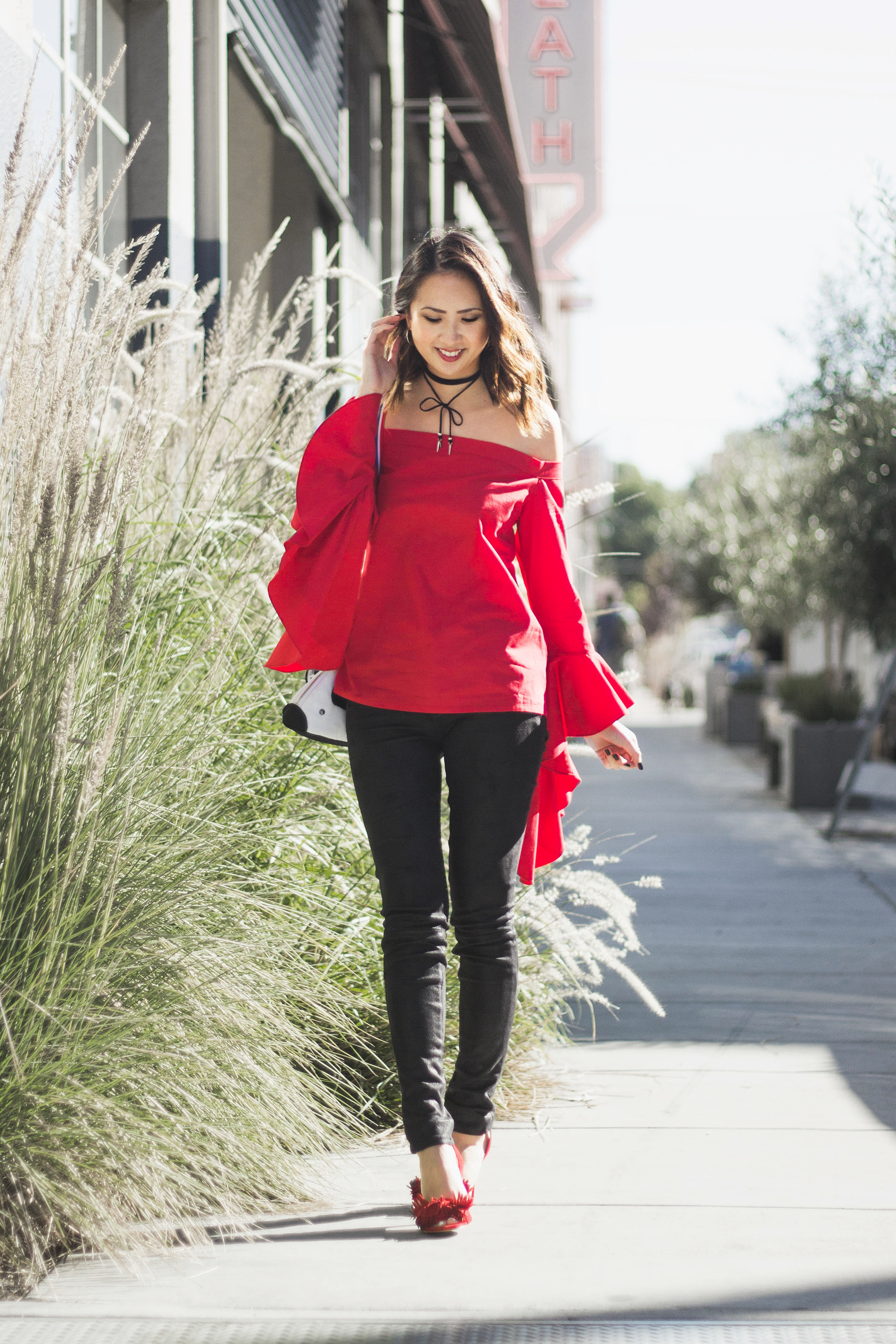 red off the shoulder top patricia chang french mouse bag