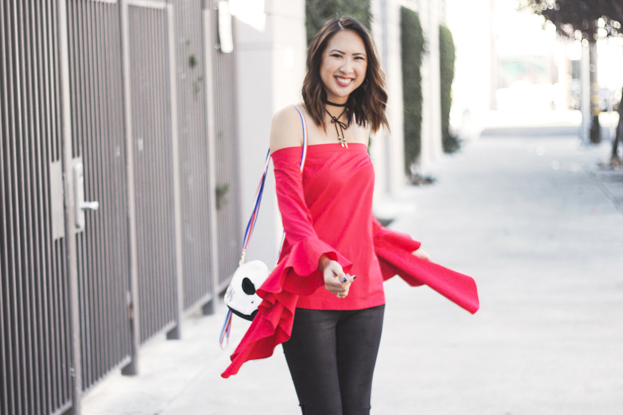 red off the shoulder top patricia chang french mouse bag